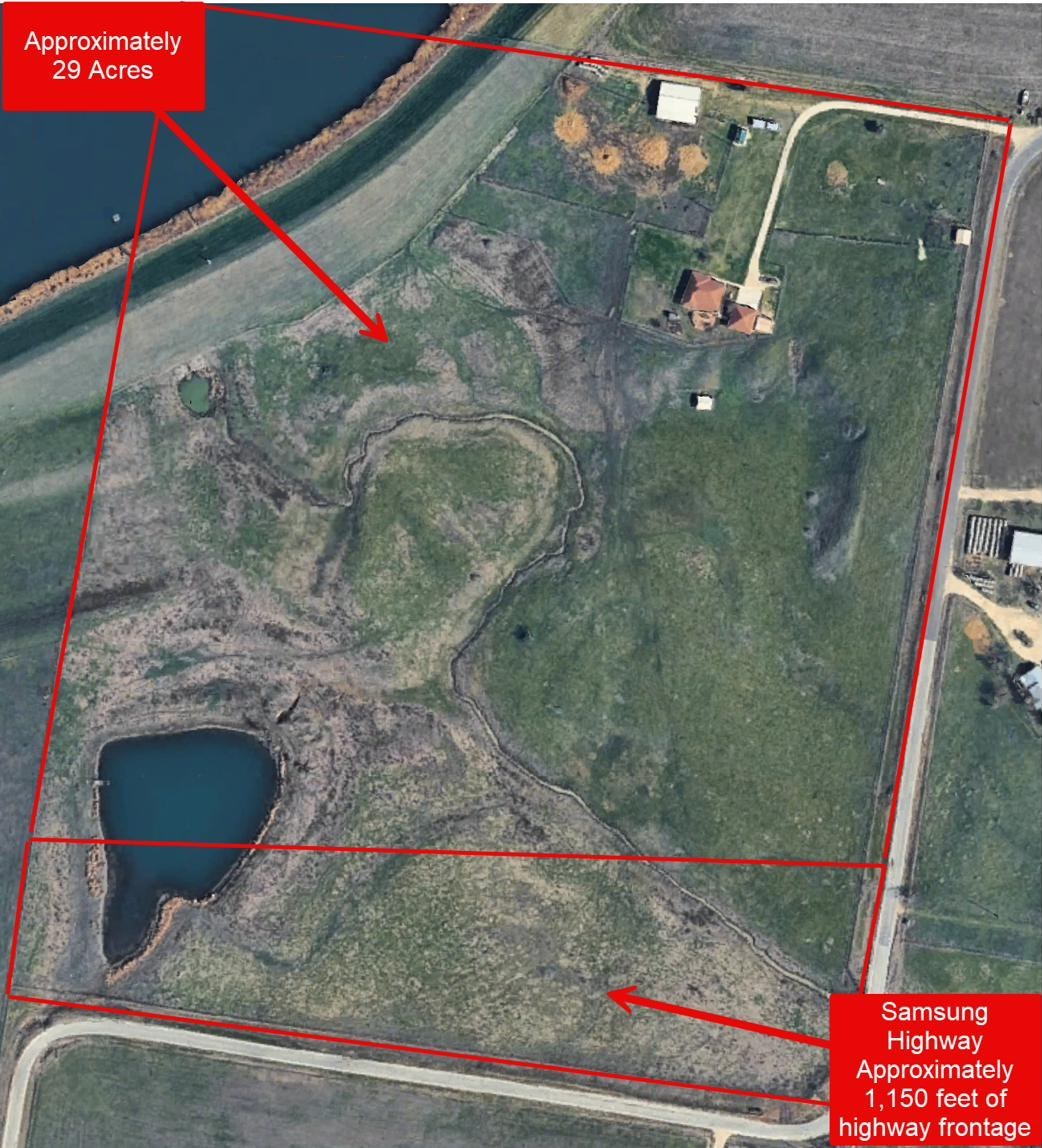 Aerial view with the property outlined in red. A callout marks approximately 29 acres and another marks approximately 1,150 feet of Samsung Highway frontage along the south edge.